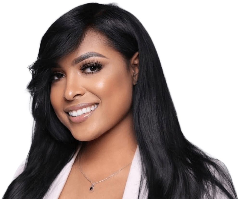 Young beautiful woman with bronze skin smiles at the camera. He hair is straight and styled.